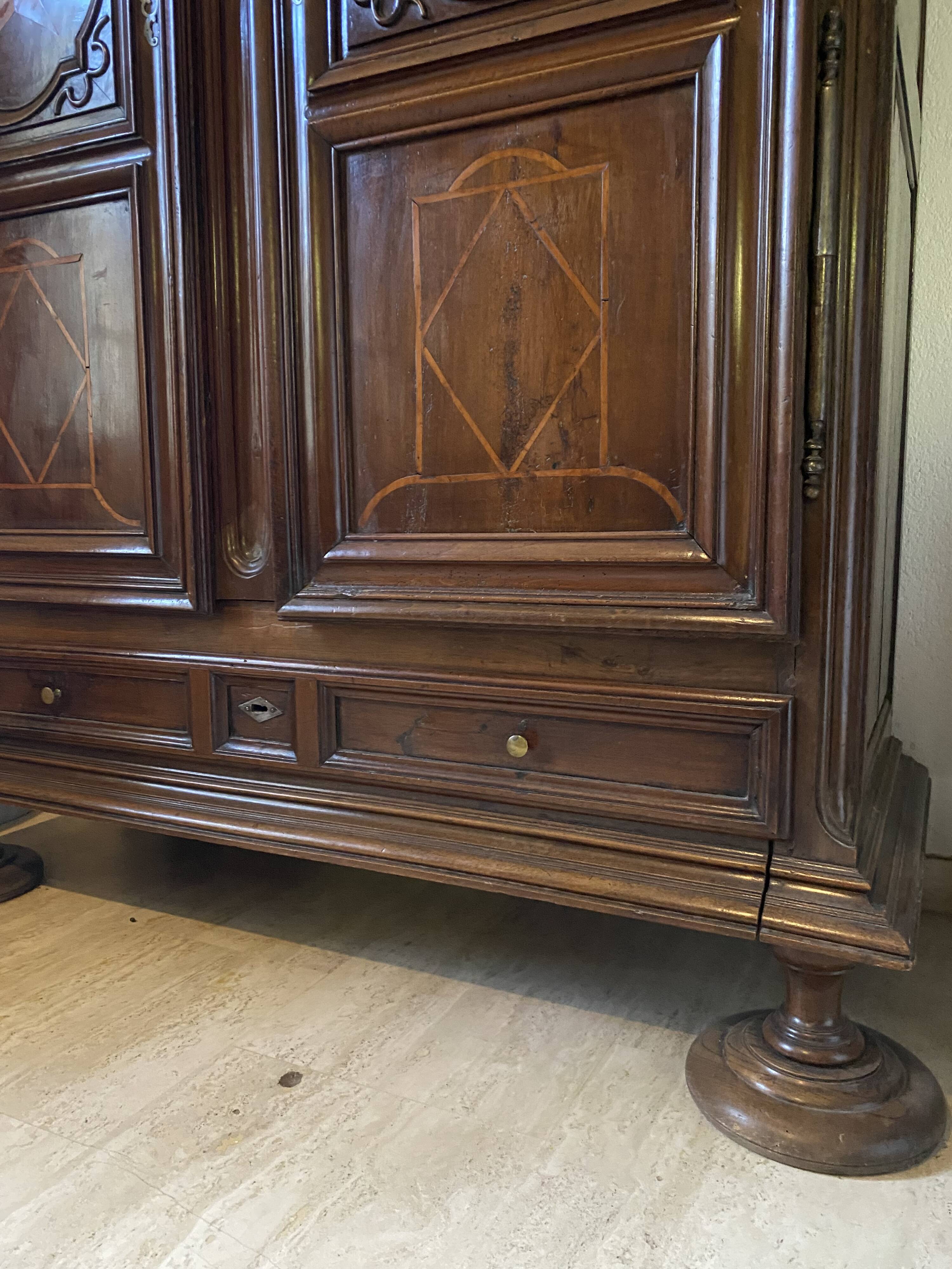 “Large regional 18th-century walnut inlaid wardrobe”