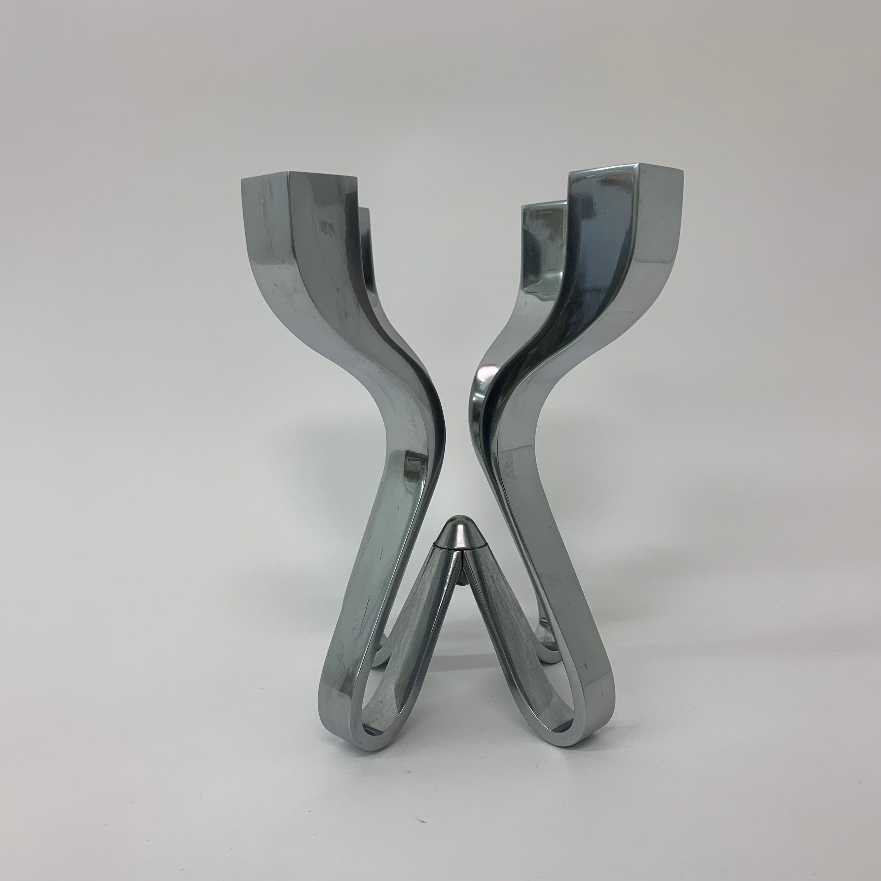 A chromed metal candle-holder "Chorus", design Karim Rashid, executed by Umbra / USA 2002