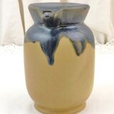 Vintage art deco water pitcher with drippy dark blue glaze.