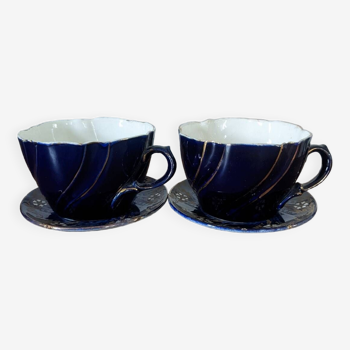 Set of two large Lunéville cups and saucers