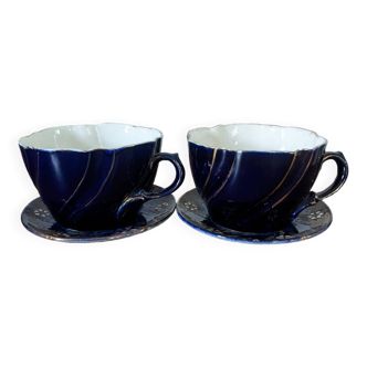 Set of two large Lunéville cups and saucers