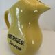 Old yellow pitcher anisette berger syrups, vintage bistro decoration