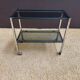 Metal and smoked glass dessert table