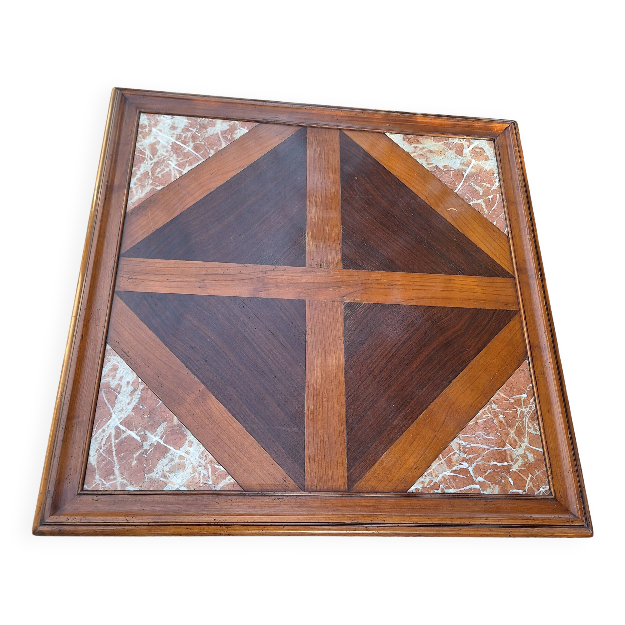 Coffee table with wood marquetry and marble inlays.