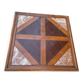 Coffee table with wood marquetry and marble inlays.