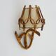 Louis Sognot rattan and bamboo wall light. 1950s