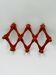 Vintage orange accordion coat rack