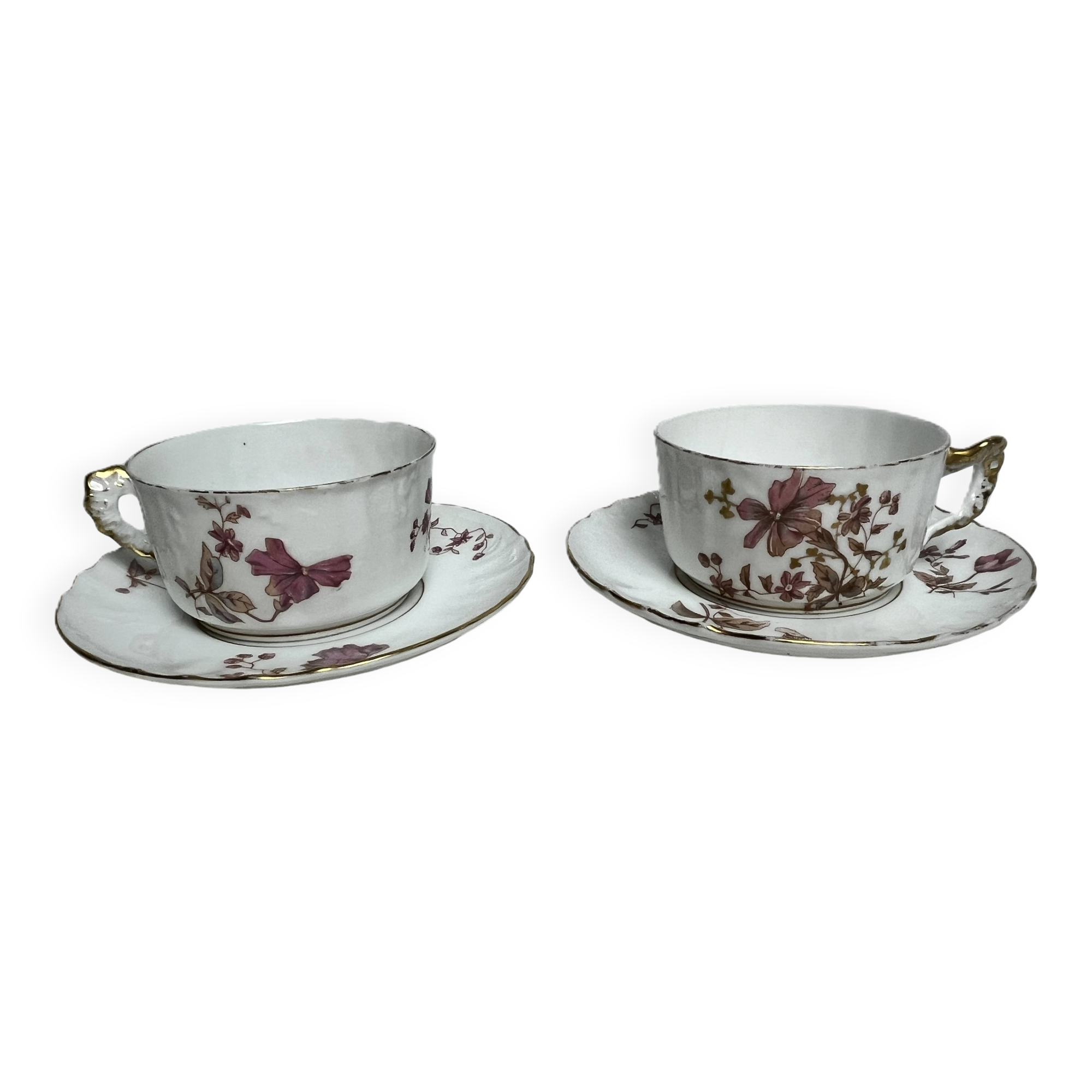 Two English porcelain teacups with floral decoration, 19th century