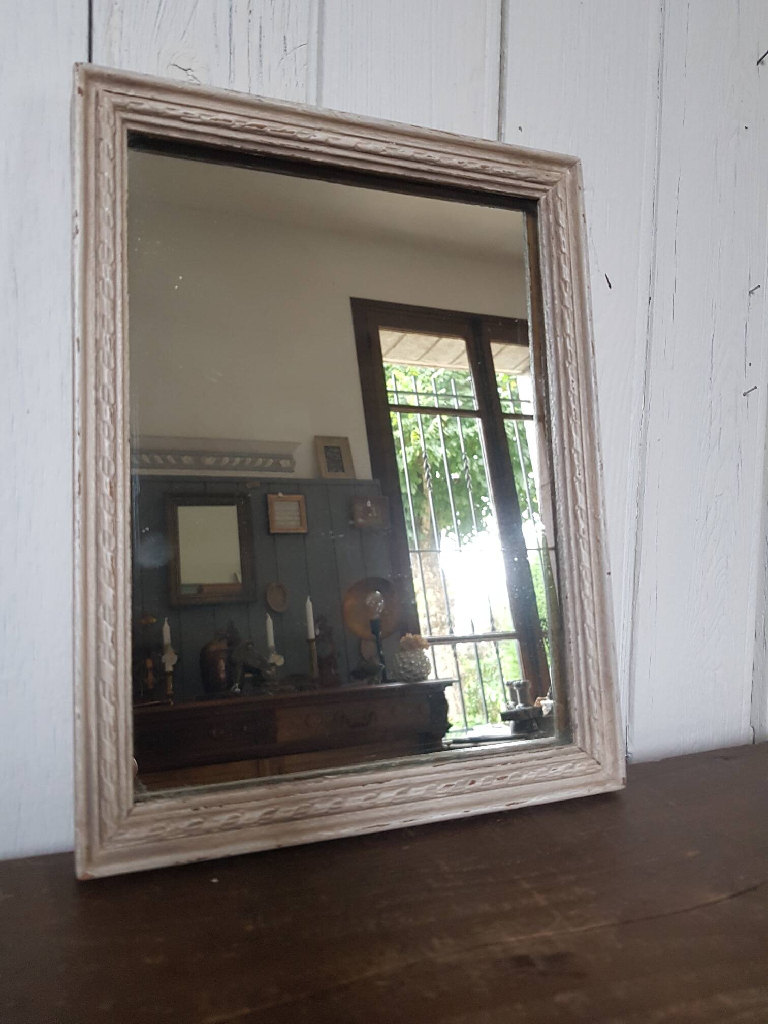 Small patinated wooden linen mirror