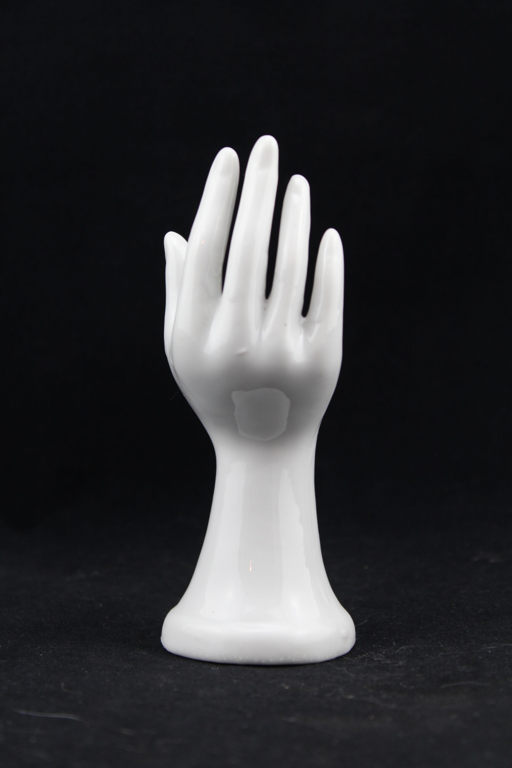 White ceramic, doilies, Ring Sizer, hand