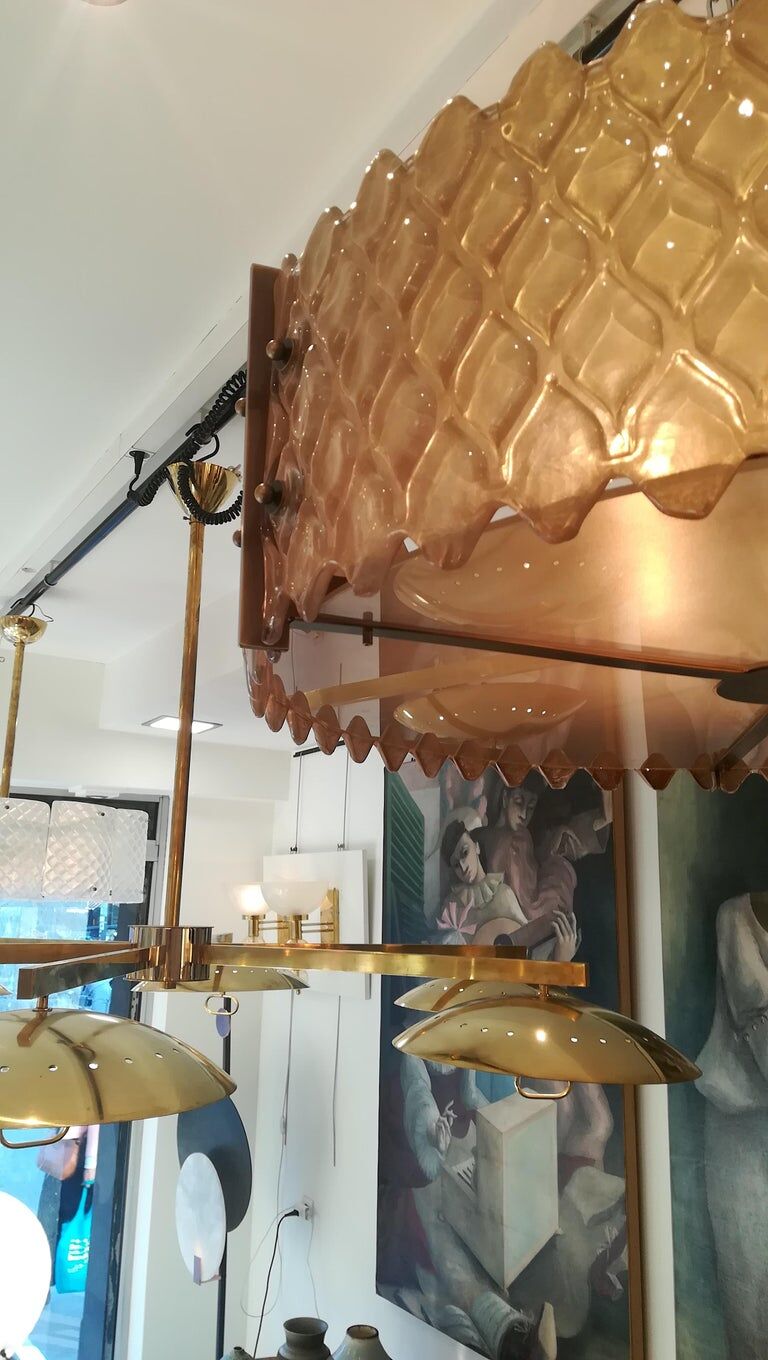 Patinated brass lurstre, and Murano glass