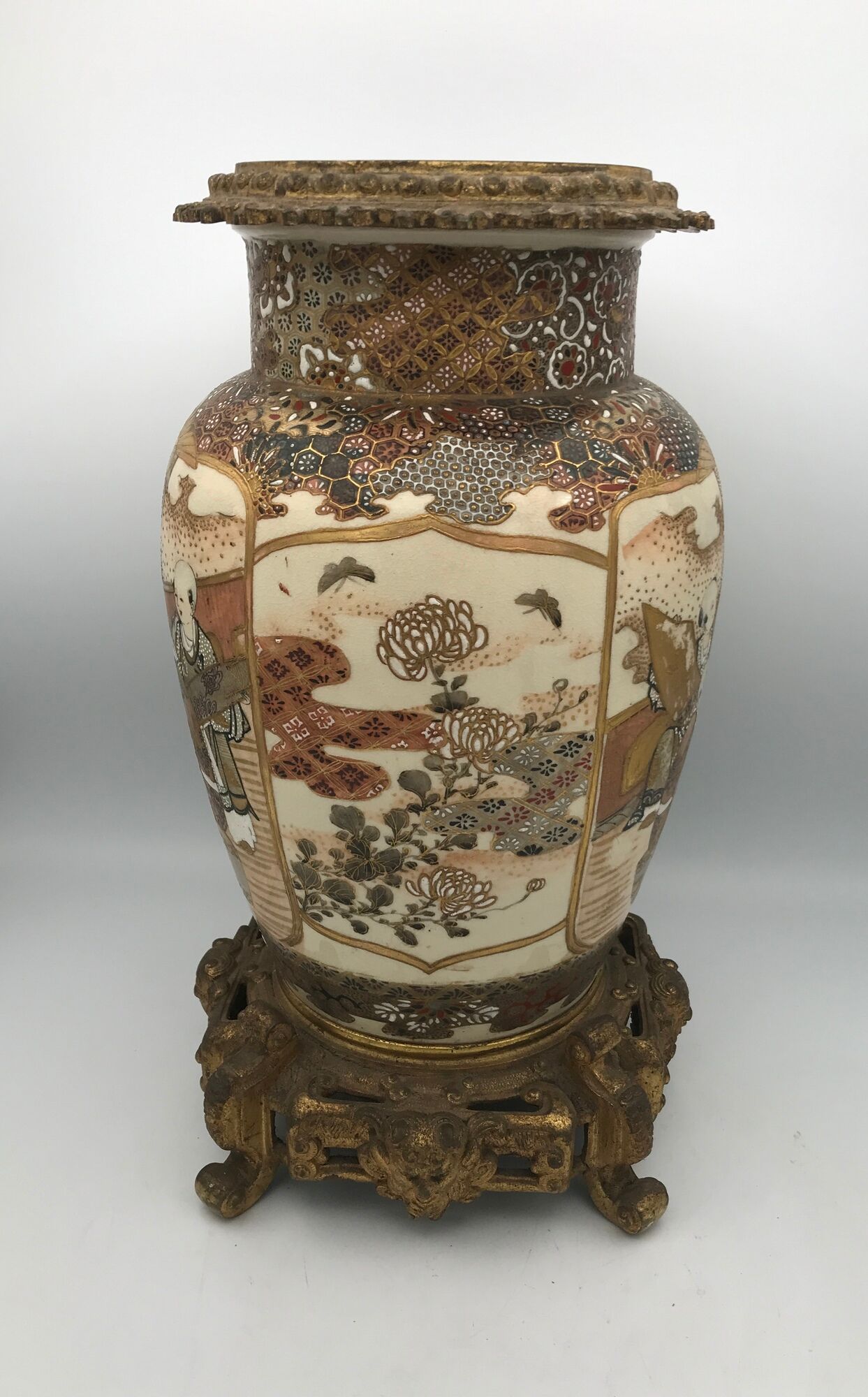 Old satsuma ceramic vase with various decorations mounted on bronze