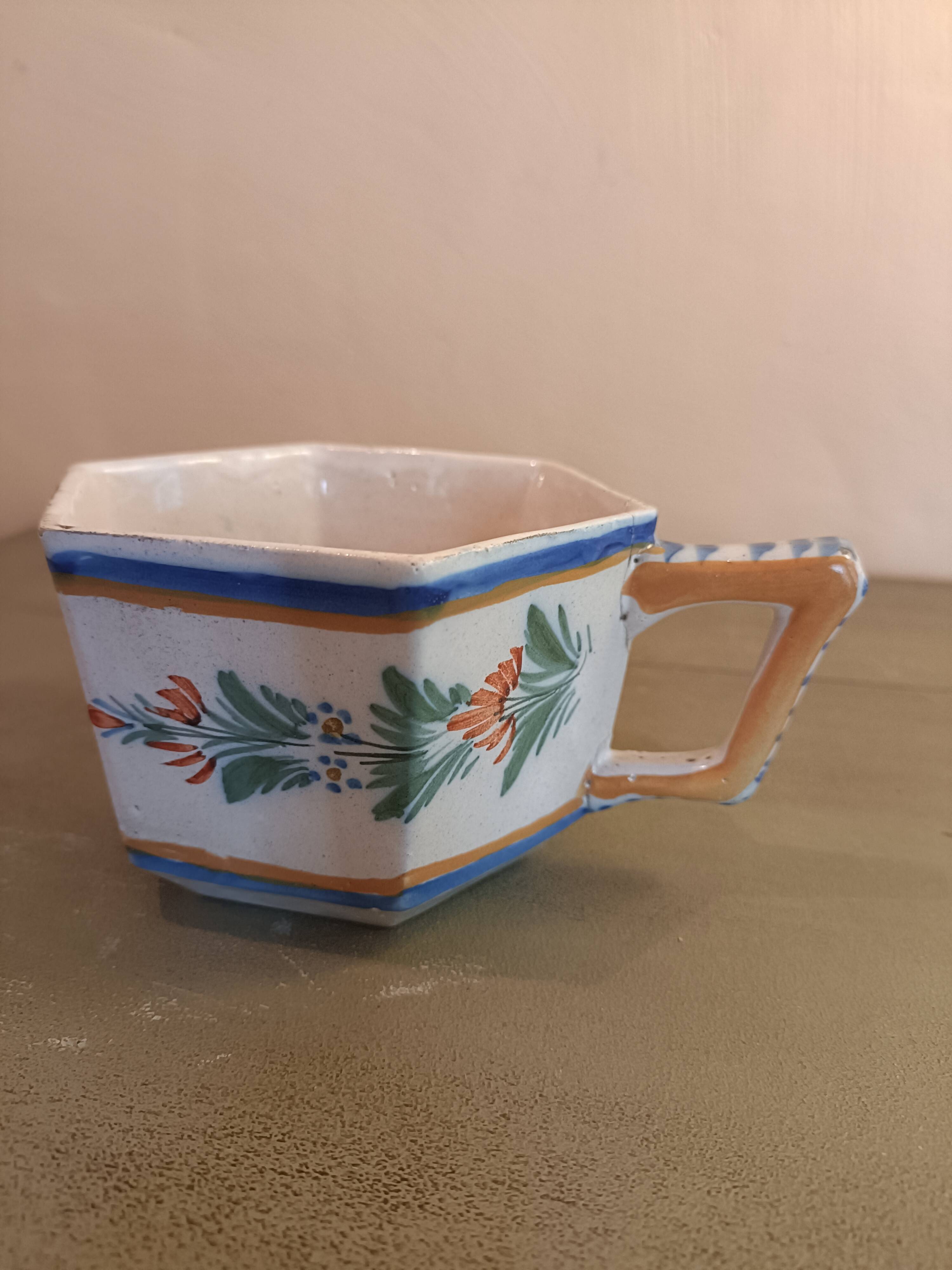 Hexagonal cup signed Henriot HR Quimper 7. Good condition.