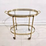 Golden metal dessert with glass tops