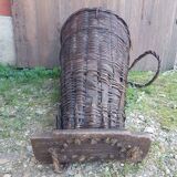 Old grape pickers basket woven wicker vintage wine vines decoration