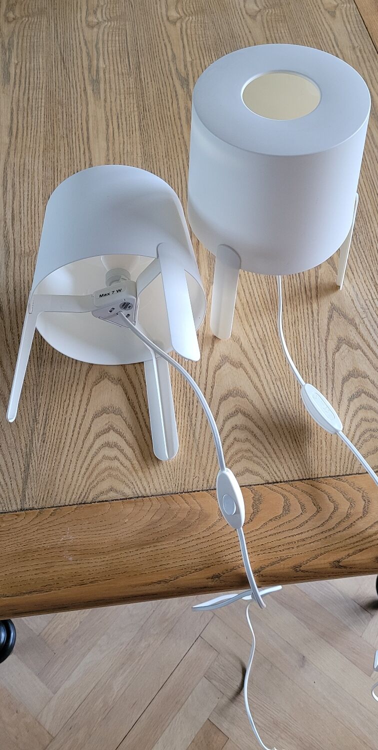 Pair of white Ikea Tvärs bedside lamps