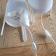 Pair of white Ikea Tvärs bedside lamps