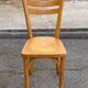 2 Scandinavian bistro chairs by Baumann in light wood from 1980.