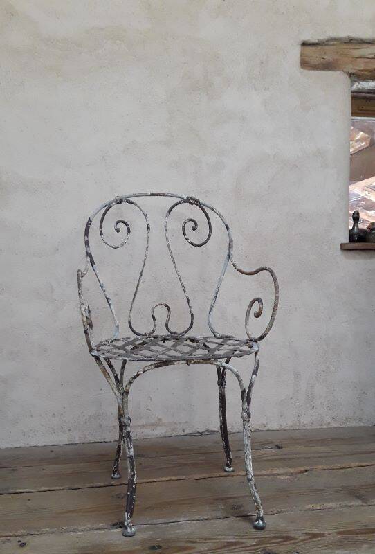 19th-century garden armchair in wrought iron