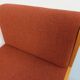 Fauteuil chauffeuse Fröscher vintage en tissu orange et bois des années 70 80