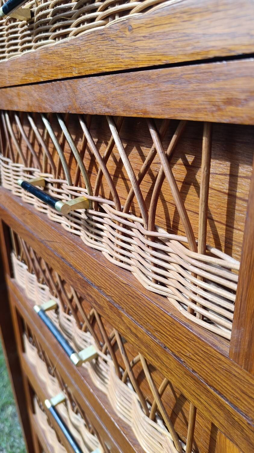 Tall chest of drawers in wood and rattan with splayed legs