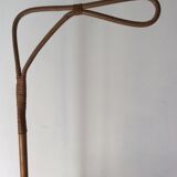 Vintage rattan cradle with its spire