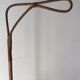 Vintage rattan cradle with its spire
