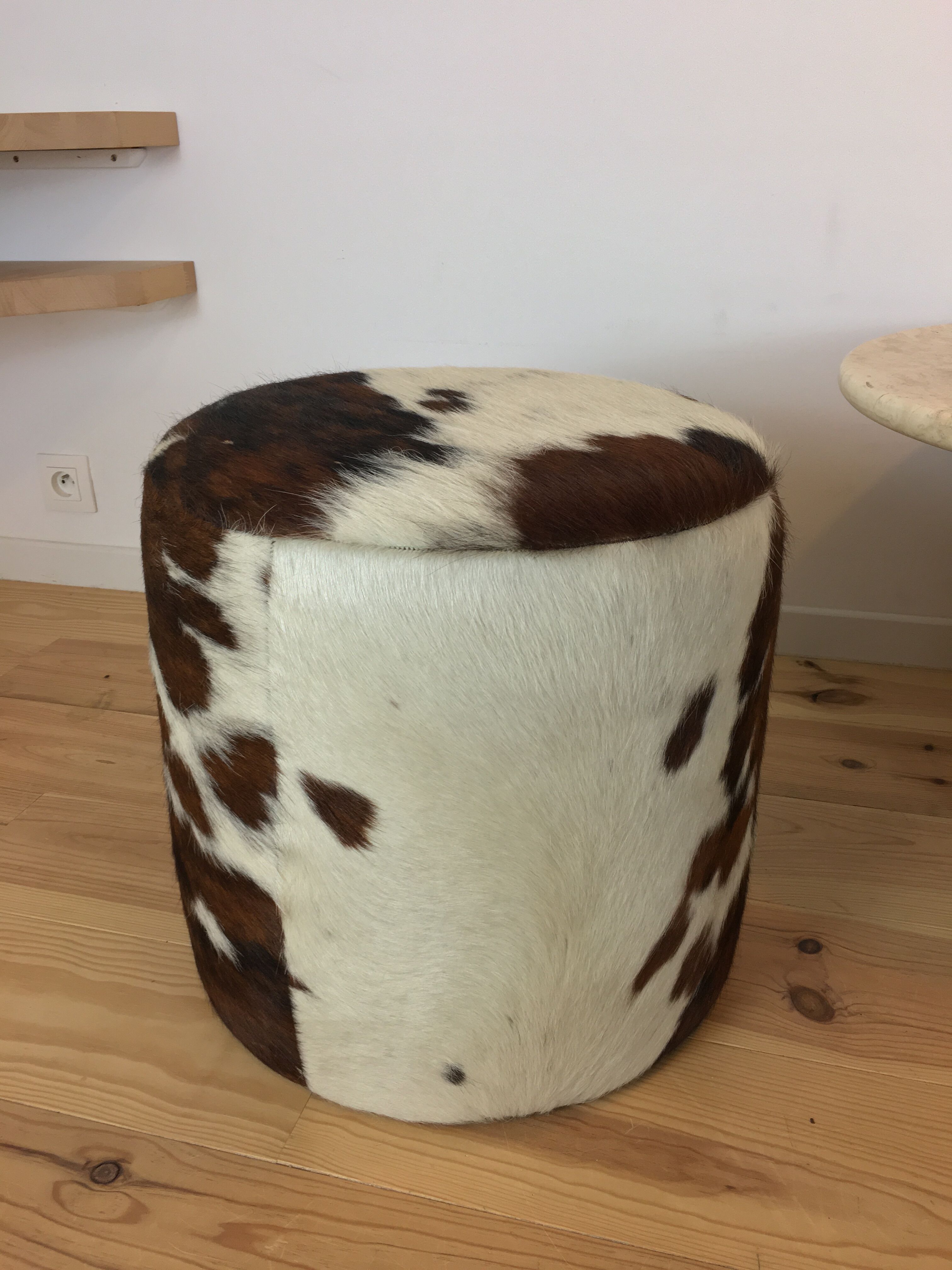 Pouf and cow cushion, leather