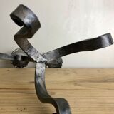 Pair of wrought iron candlesticks