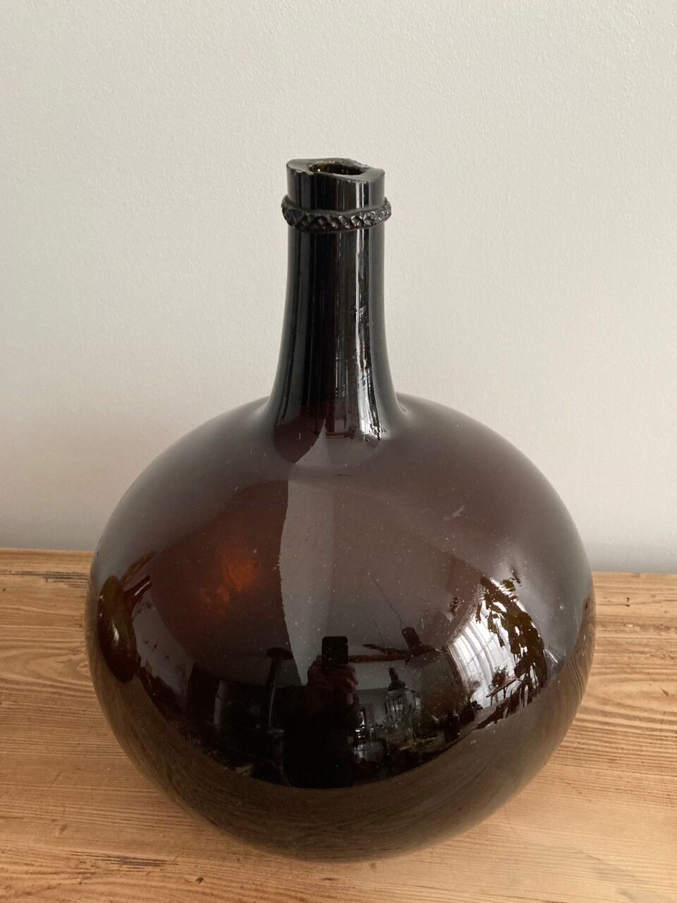 Old amber demijohn