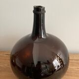 Old amber demijohn