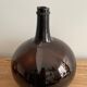 Old amber demijohn