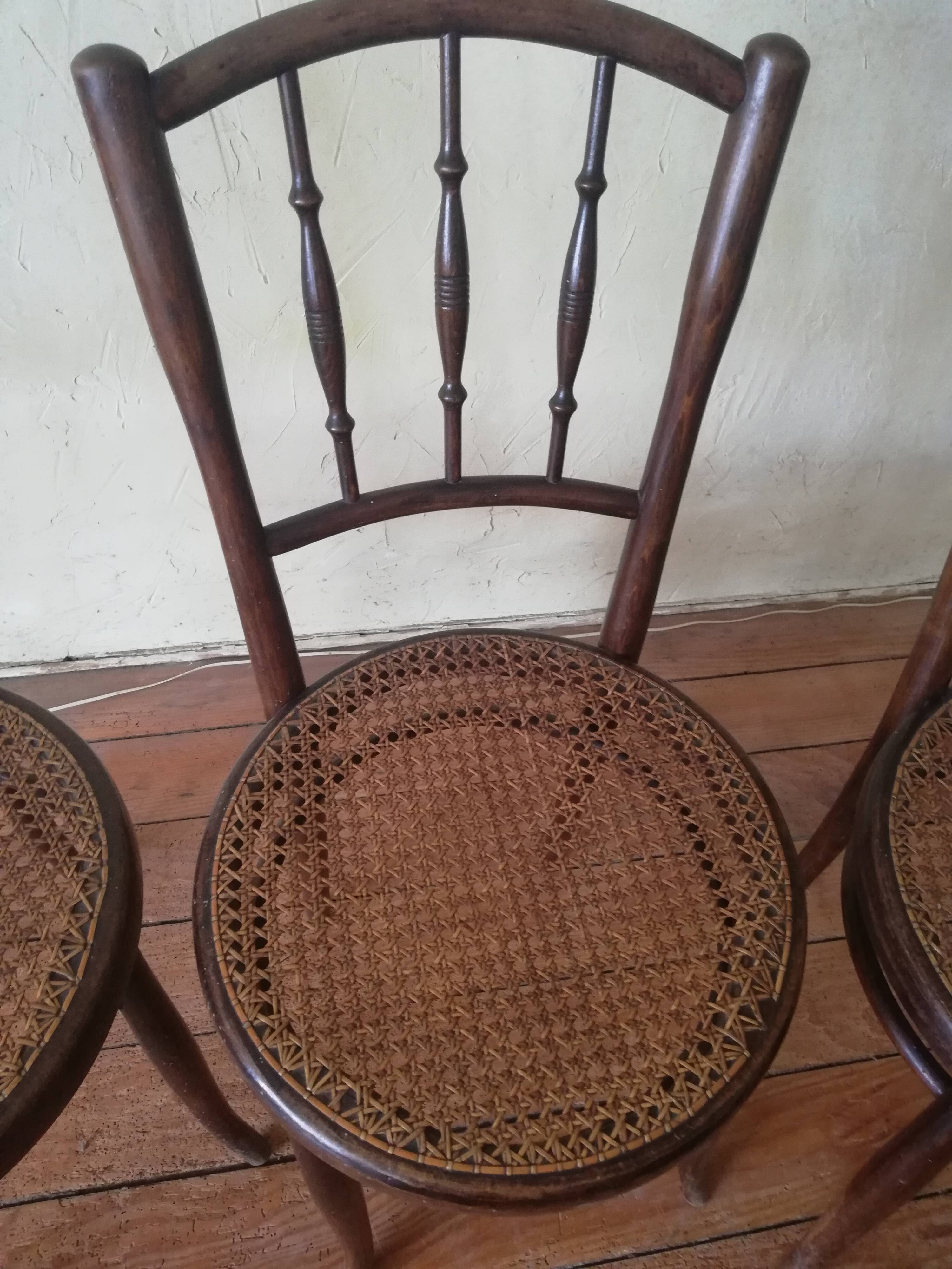Old curved wooden bistro chairs