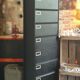 Industrial furniture with 10 metal flaps.