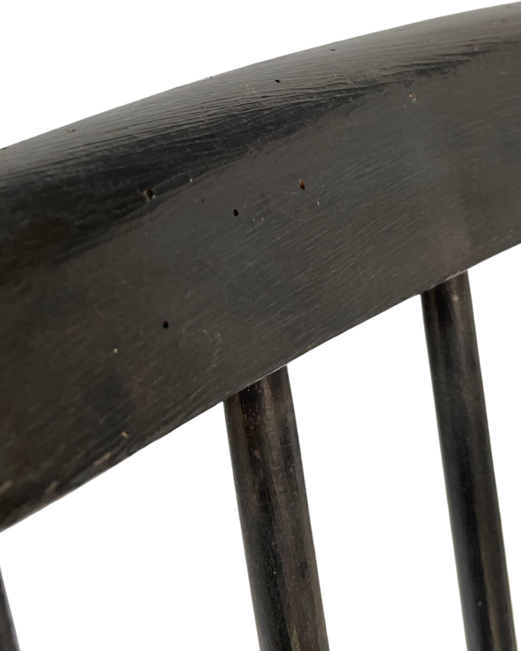 Vintage easy chair with high back and armrest from the 60s