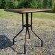 Bistro table in teak and wrought iron