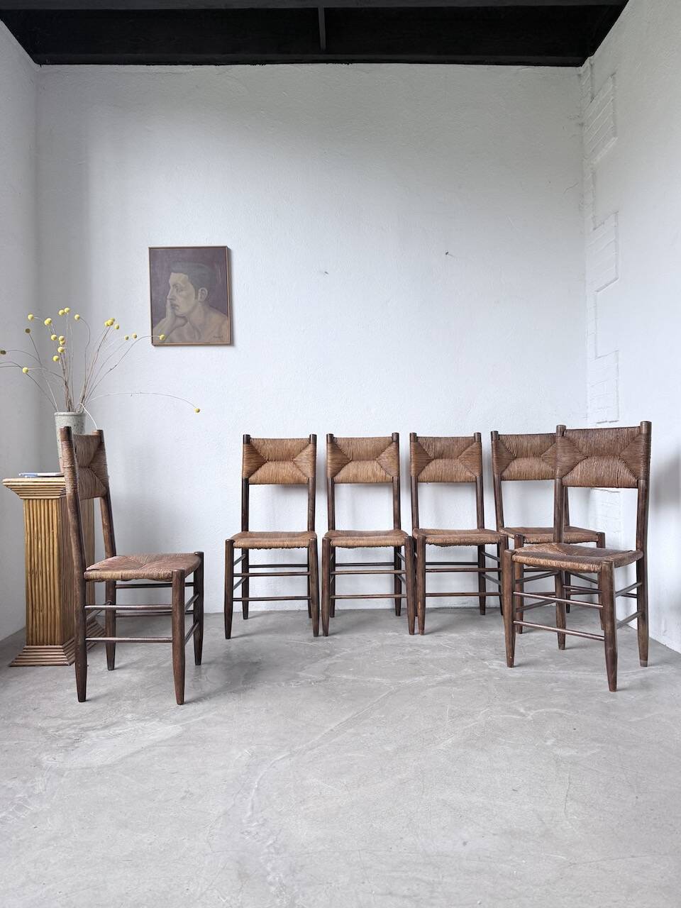 Set of 6 straw and oak Beauche chairs.
