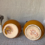 Enameled jugs signed Gomares