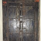 Old wooden door with frame