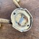 Antique double coat hook in solid brass