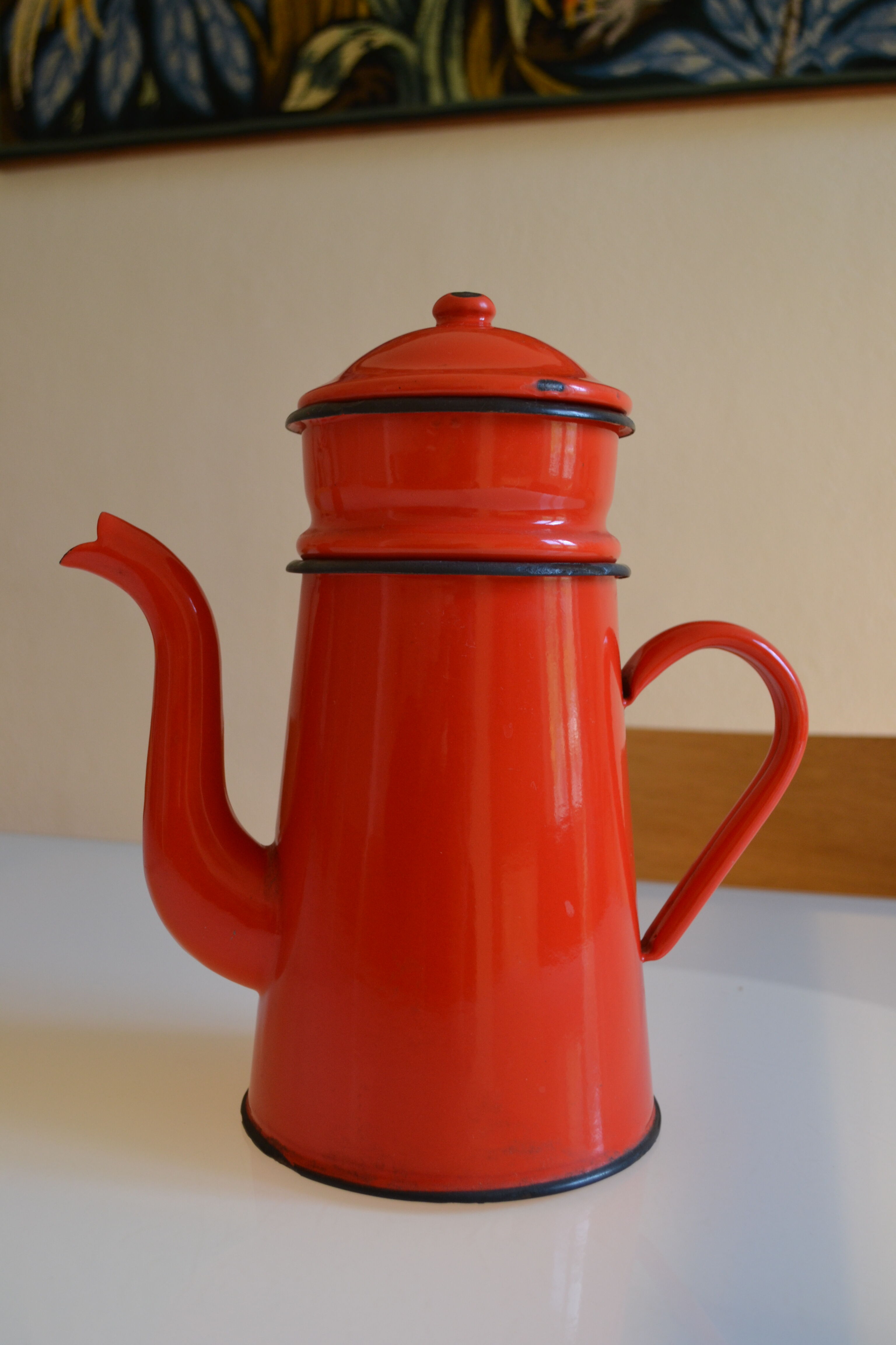Vintage coffee maker in red and black enamelled sheet