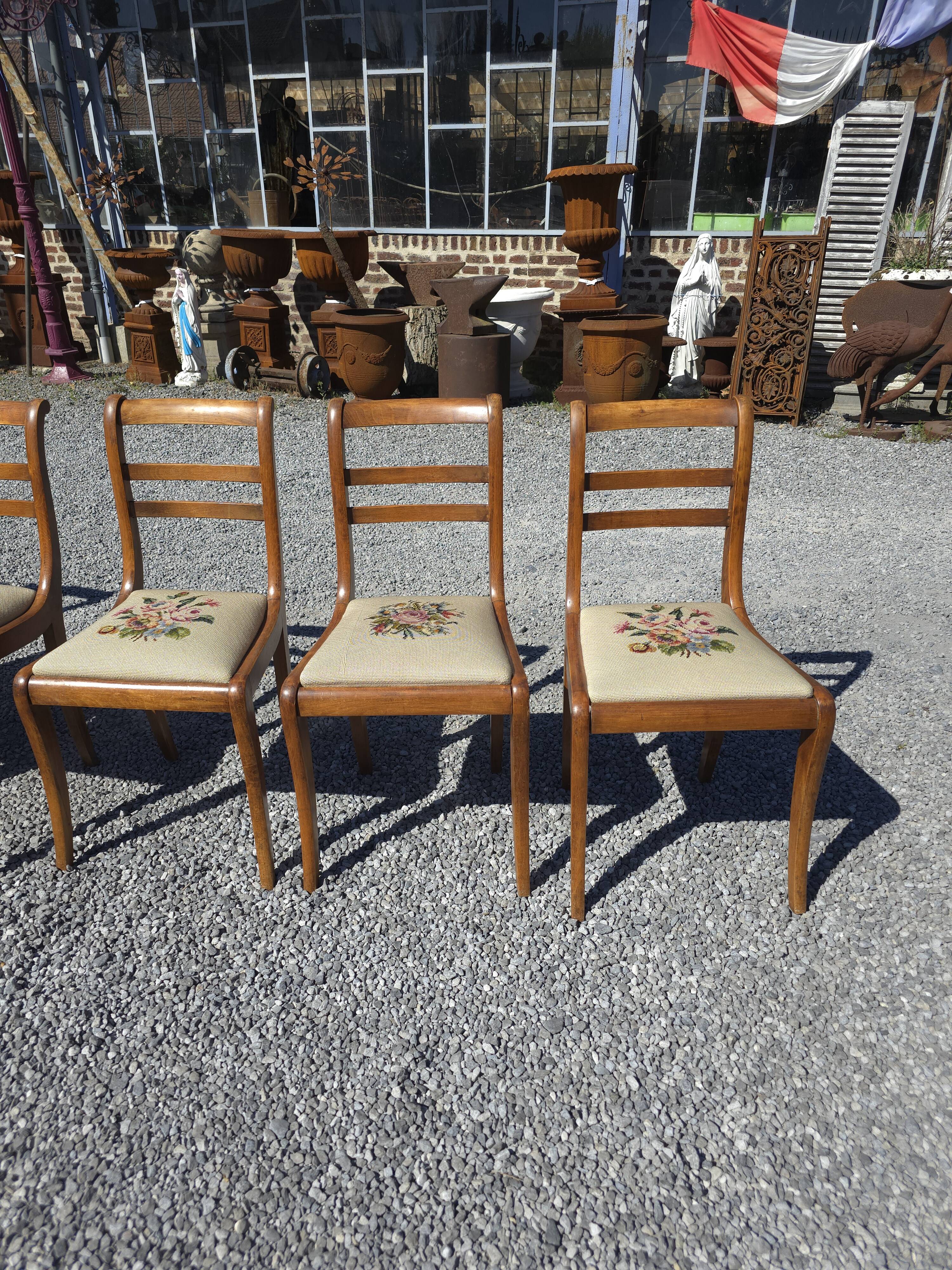8 cherry wood chairs with embroidered seats