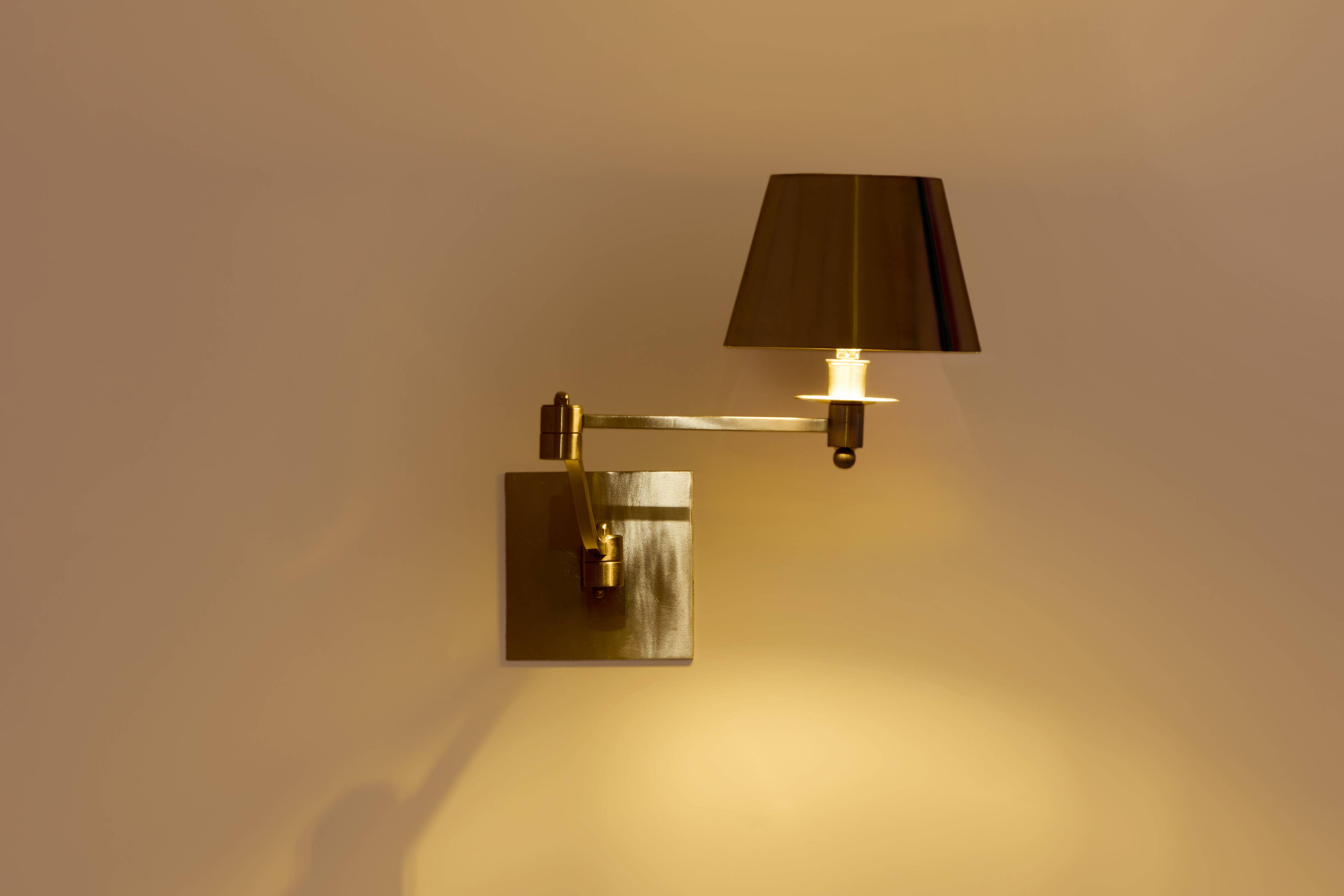 Maison Charles adjustable wall light, brushed steel, circa 1960