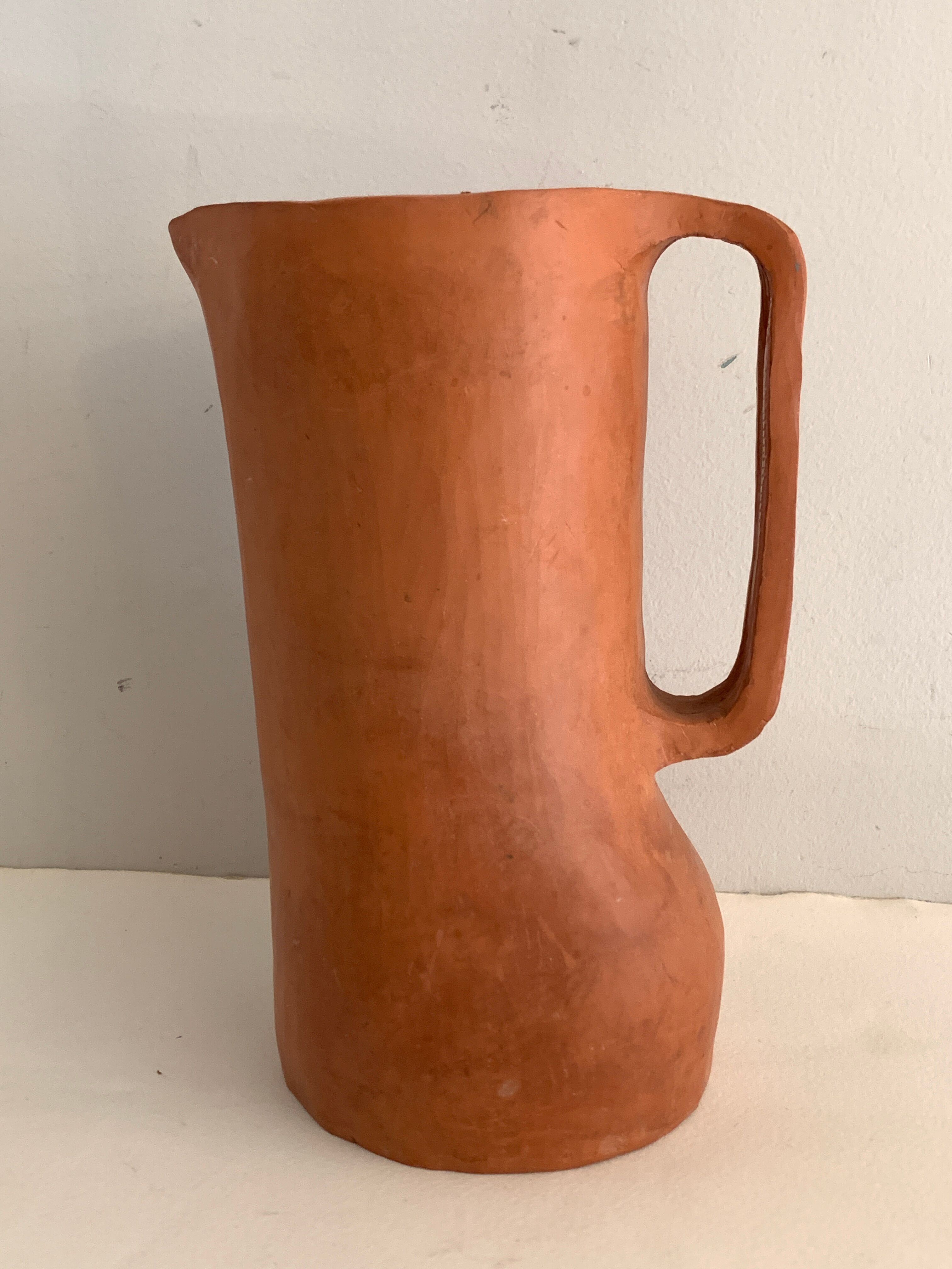 Signed terracotta pitcher or vase