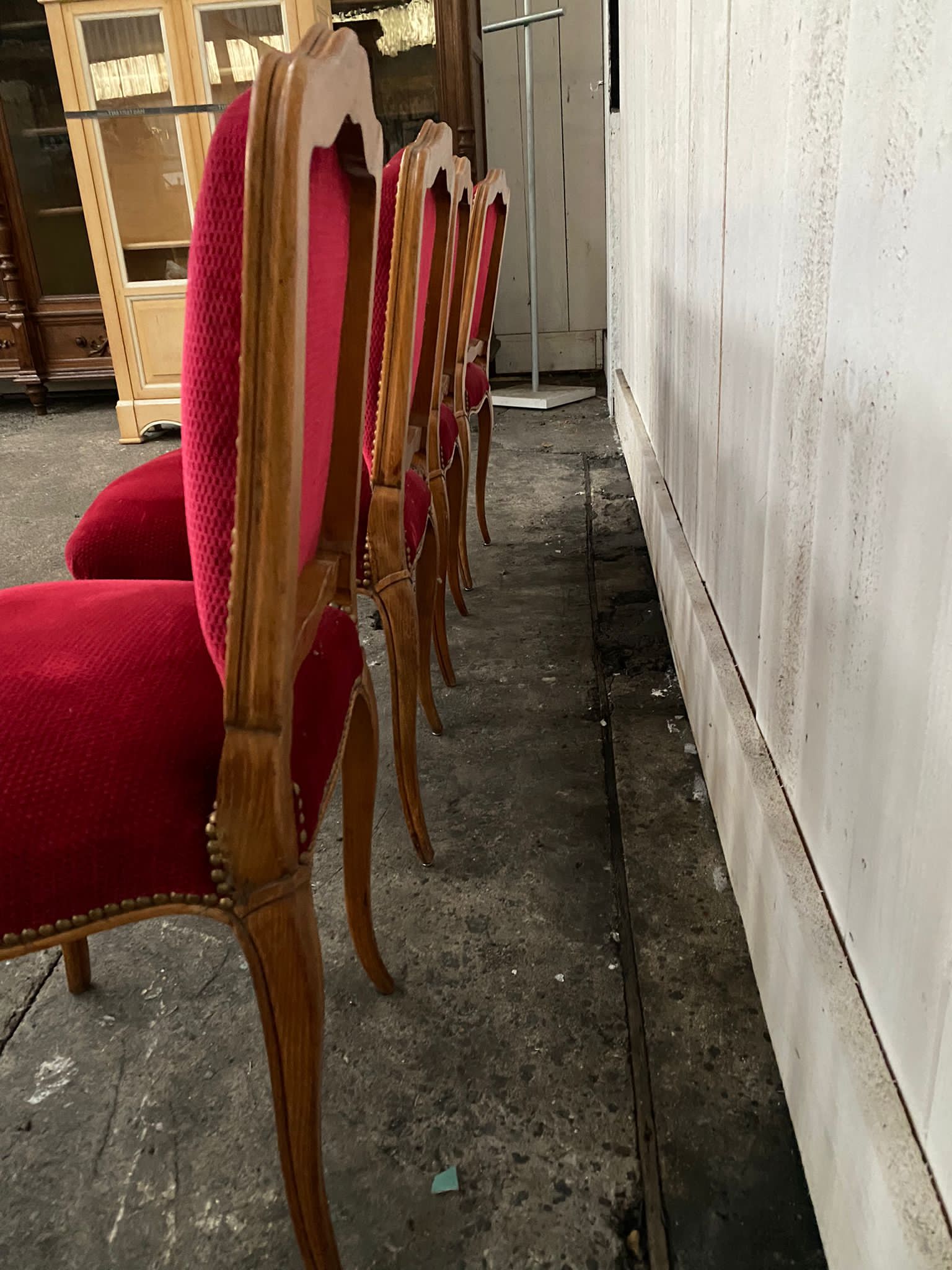 4 red Louis XV style chairs