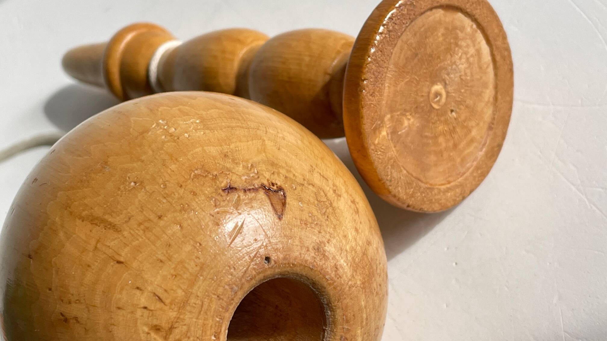 Vintage wooden cup-and-ball toy