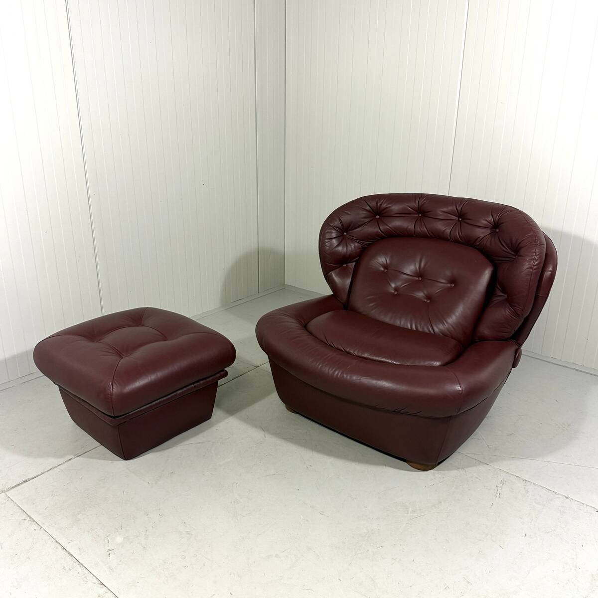 French burgundy leather space age lounge chair & footstool 1970’s