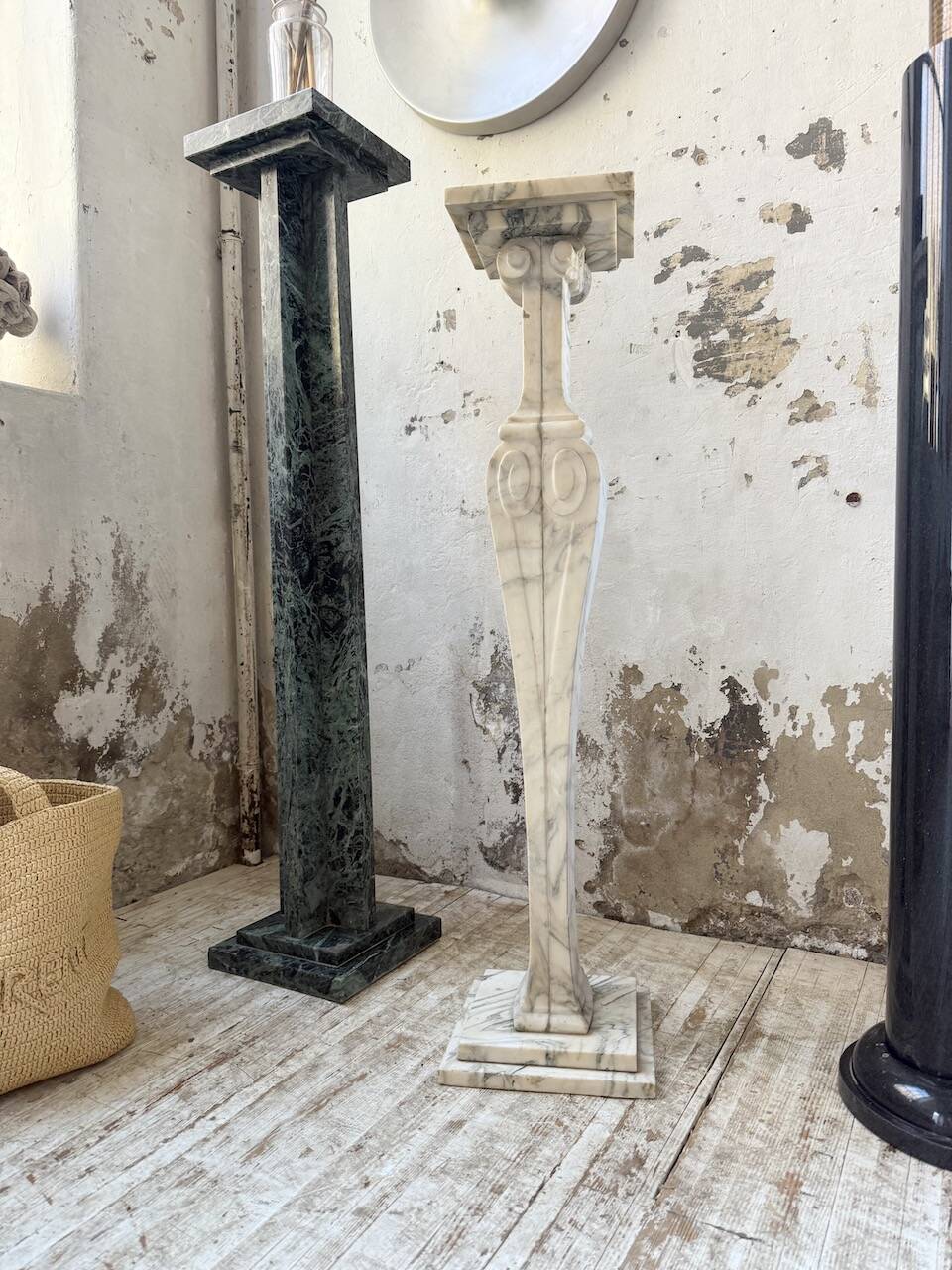 Set of 4 marble columns or pedestals.