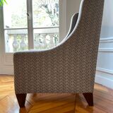 Fauteuil gris clair réalisé par un artisan