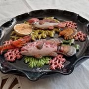 Decorative plate of fish barbotine Vallauris
